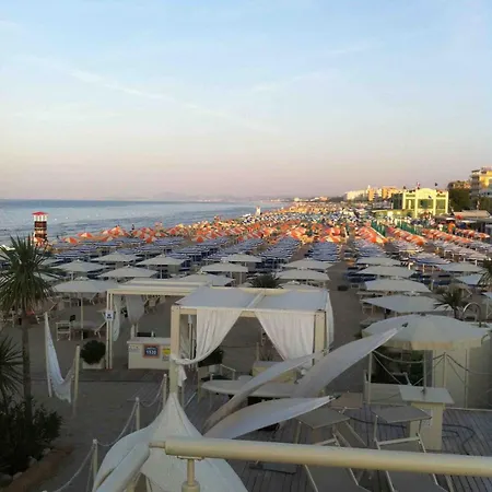 Daire Ostra, Full Moon, Rising Sun Close To The Sea Ostra